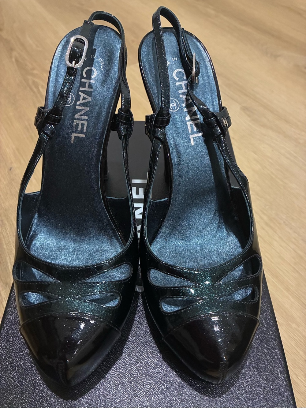 CHANEL Black Patent Leather Slingback Pumps with Cutout Detail